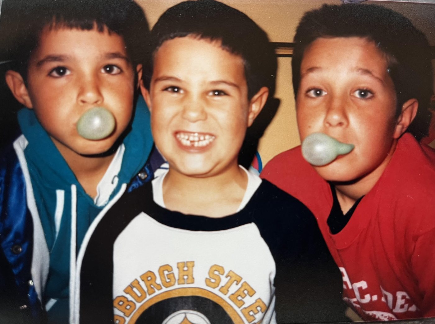 Tony, Kevin and Fred as kids blowing bubble gum