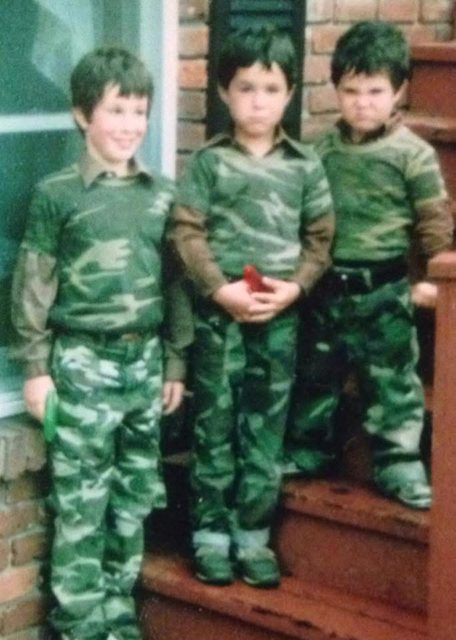 Fred, Tony and Kevin as kids in matching camouflage outfits
