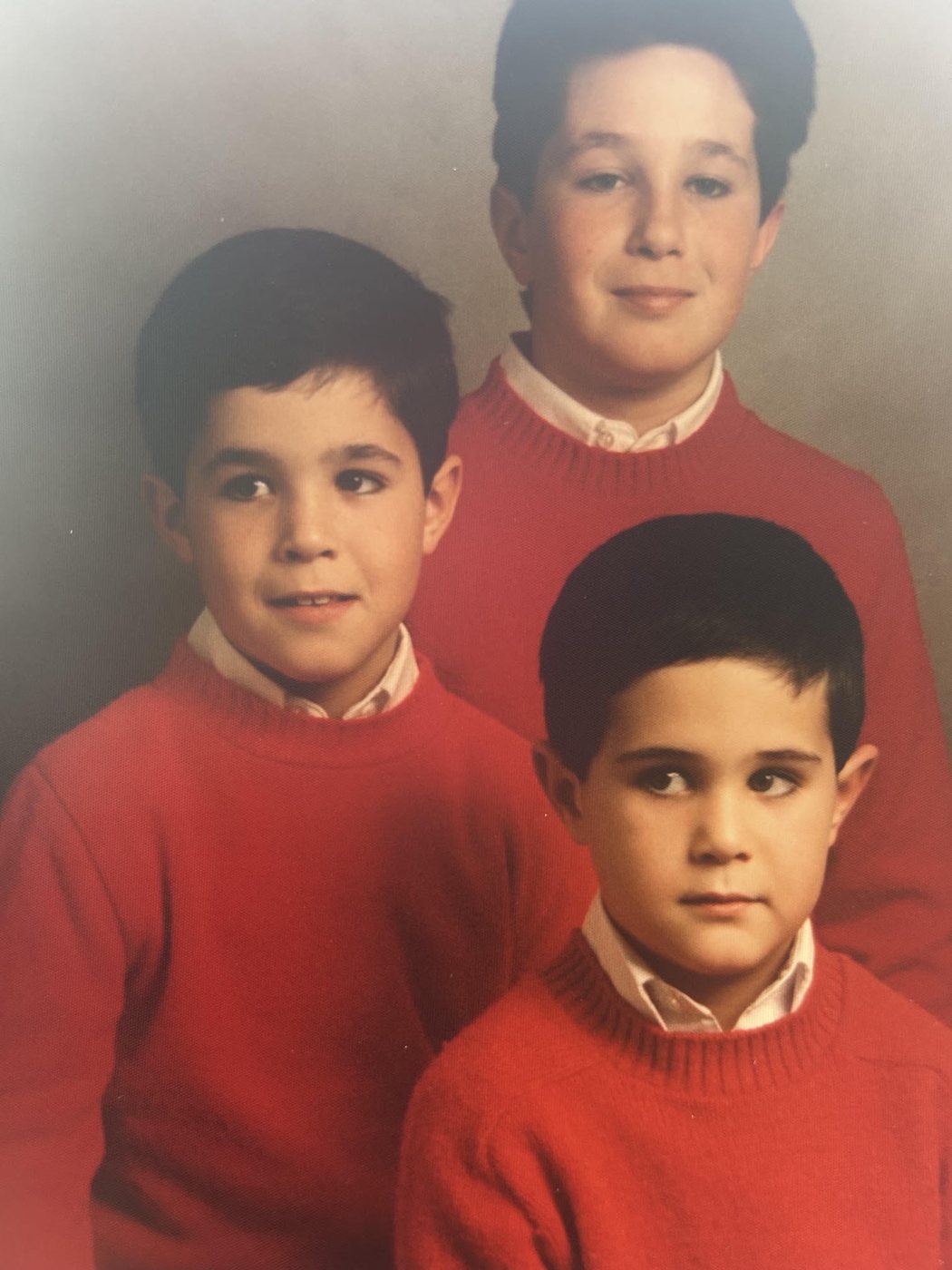 Tony, Fred and Kevin as kids in matching red sweaters